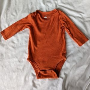 Orange bodysuit